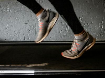 Focus on sneakers during a dynamic workout move